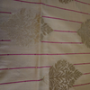 Cream Banarasi Silk Saree with Subtle Golden Zari & Tassel Detailing