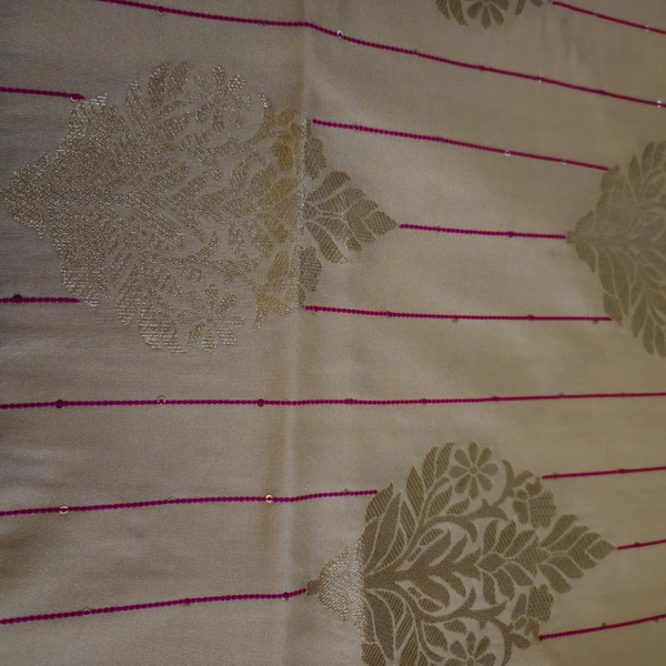 Cream Banarasi Silk Saree with Subtle Golden Zari & Tassel Detailing